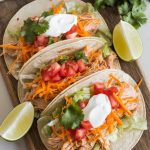 Soft flour tortillas filled with creamy shredded chicken