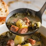 a ladle pouring Crockpot Sausage Kale Soup into a bowl