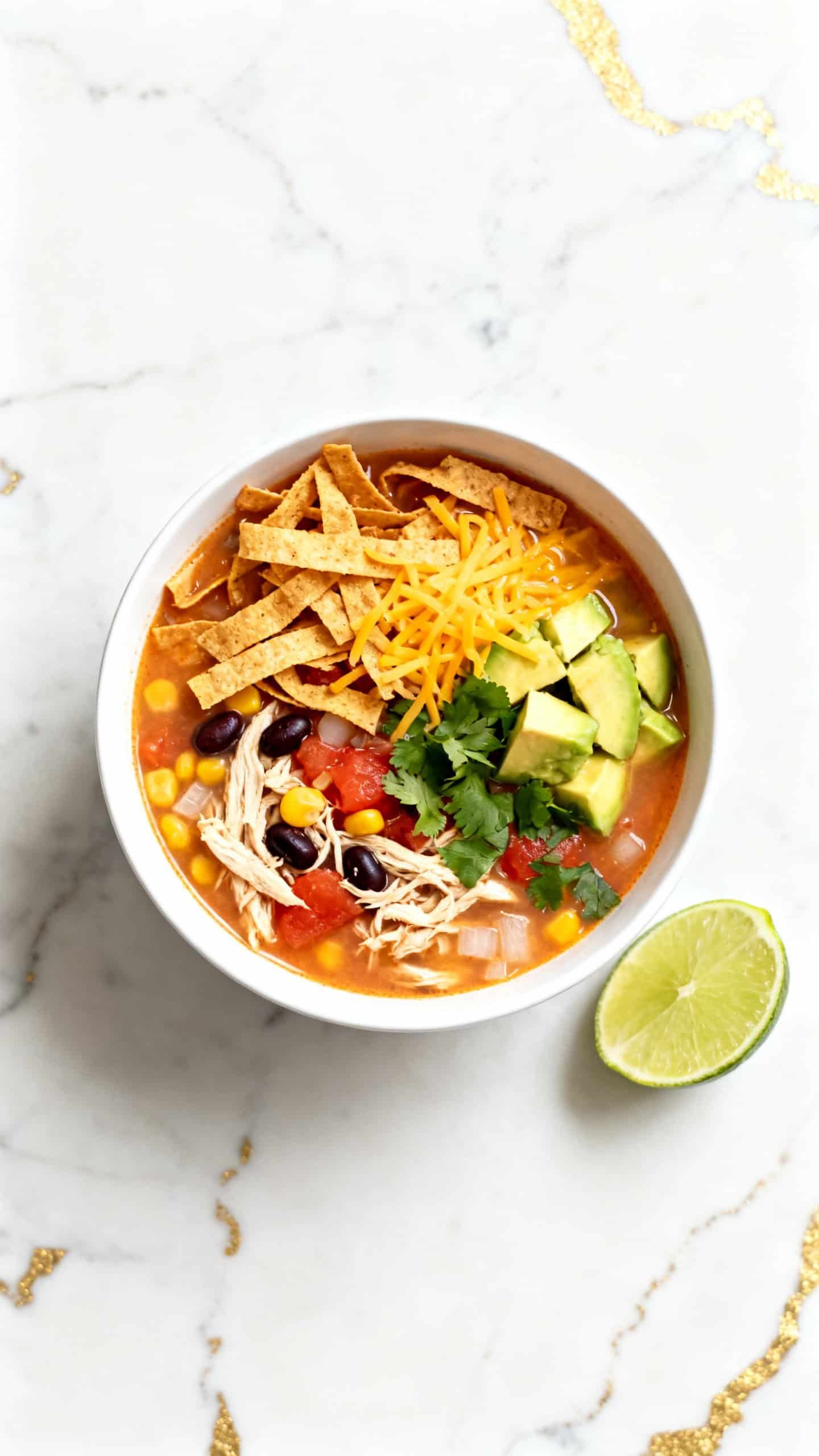 Easy Crockpot Chicken Tortilla Soup with Enchilada Sauce